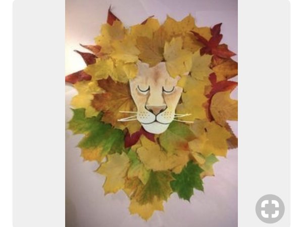 Морда льва из листьев