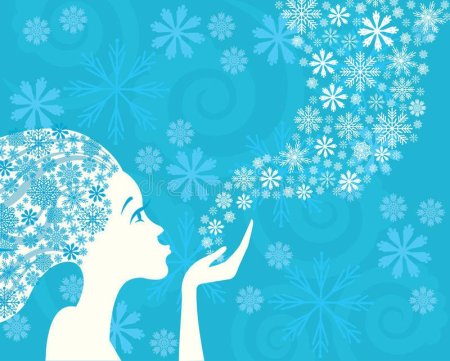 Девушка сдувает снежинки