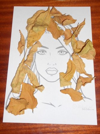 Лицо осени из листьев