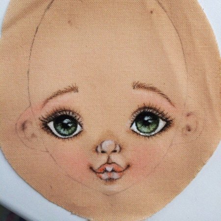 Лицо текстильной куклы